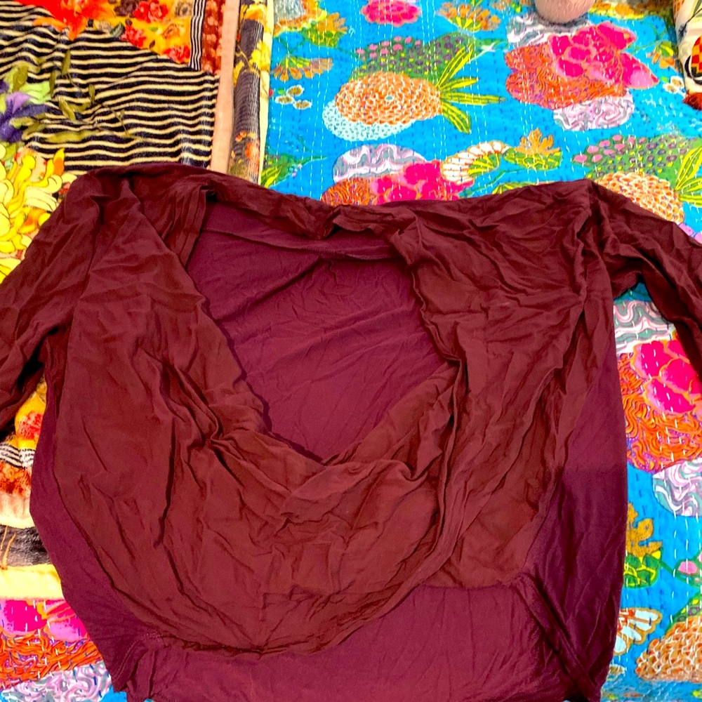 Faux wrap top.  Beautiful color.  Size L on small side.